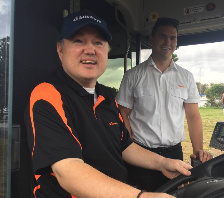 Get on the bus: Brendan Hall and Busways' Frank Maurer. Brendan will star in a short film about his dream of becoming a bus driver. Photo: Peter Daniels