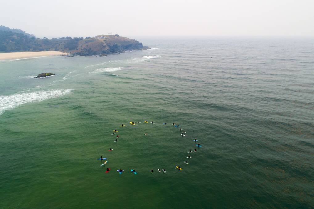 Protest: A paddle out was held at Lighthouse Beach opposing plans to drill for oil. Photo courtesy: @joshuatabone