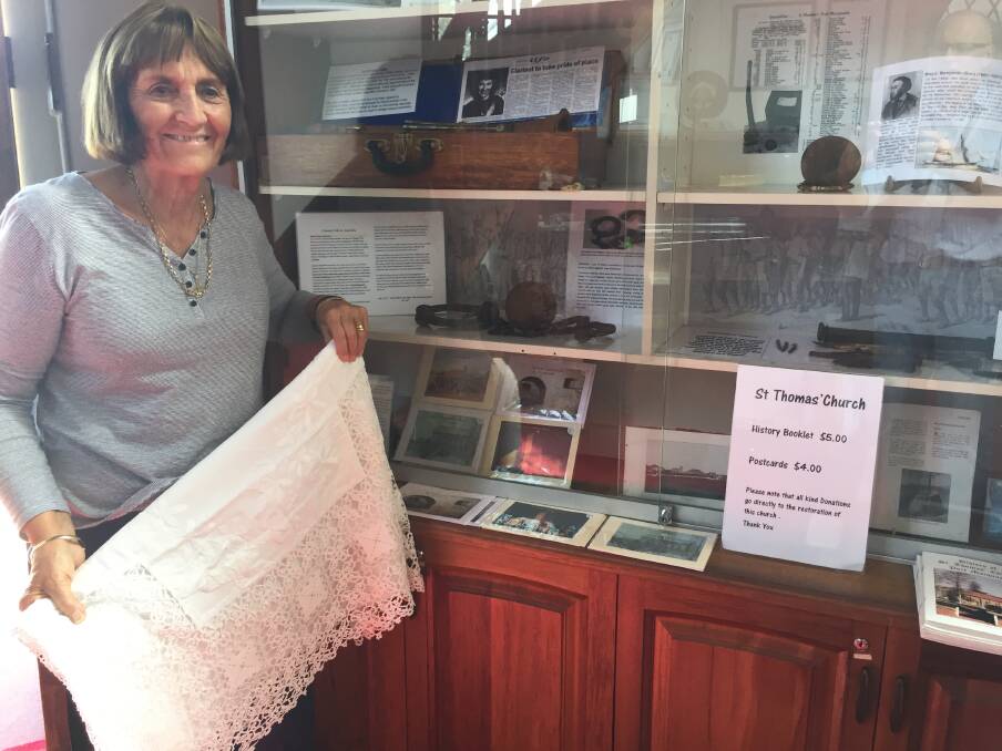 Linen feature: St Thomas' Church Port Macquarie archivist, Lorryl Rumble-Fuller organising part of the heritage linen display in preparation for the 2018 Heritage Week celebrations. Photo: Peter Daniels