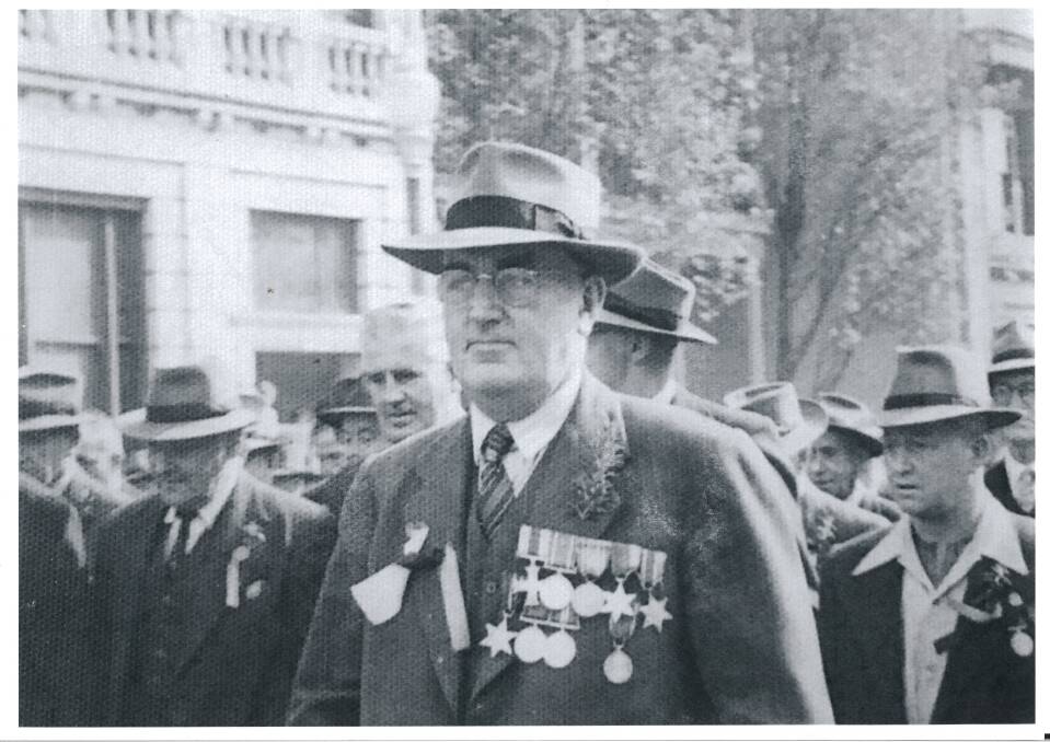 On the march: AC Elliot was a war hero, our longest serving mayor and a community leader. Photo: supplied