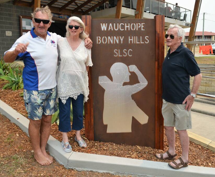 Memorial: Wauchope Bonny Hills SLSC life member Wayne Gill with Jo and Brian Stennett and the memorial to their son Simon Stennett.
