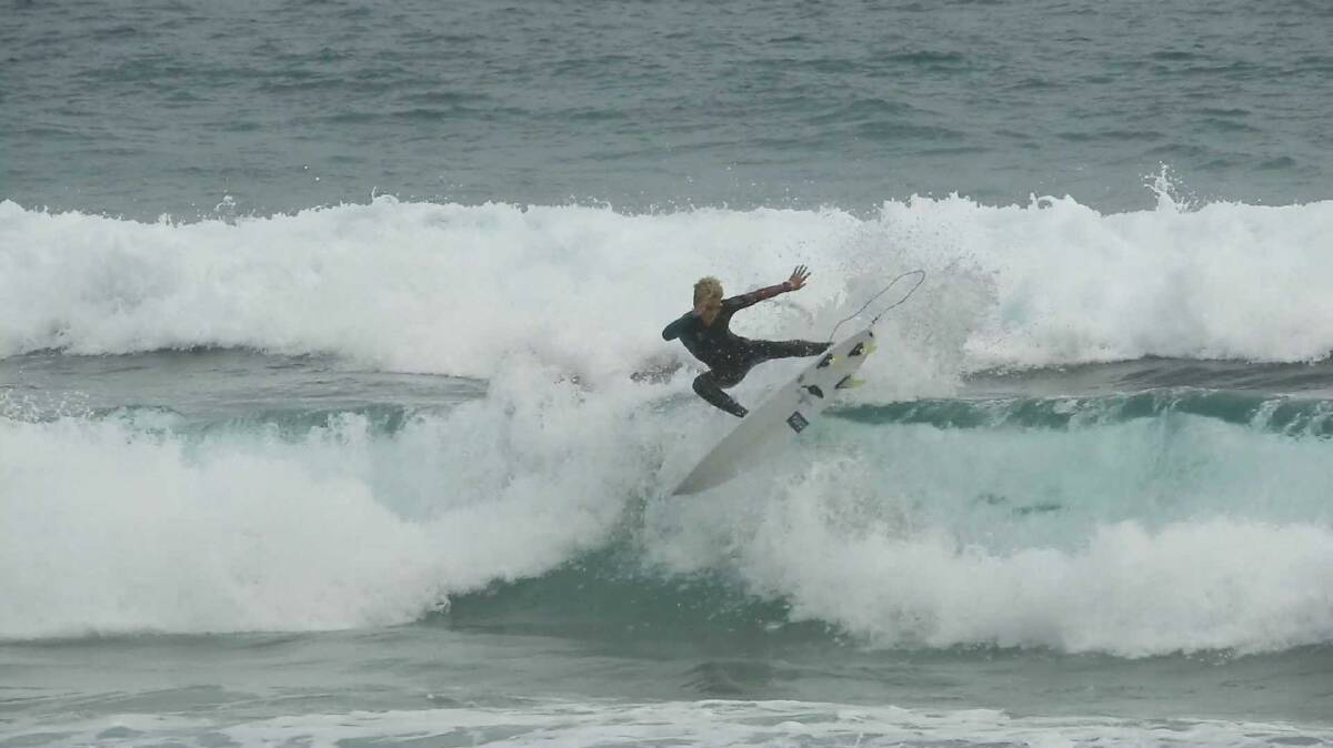Getting some air: Port Macquarie's Kayle Enfield has helped Team NSW to a third place at the Australian Junior Surfing Titles.