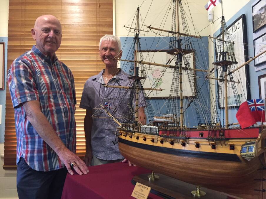 Model donated: Sydney's David Stanton and model shipwright and Port Macquarie resident Kevin Hudson with the model of the HMS Sirius that now sits proudly at the Port Macquarie Maritime Museum.