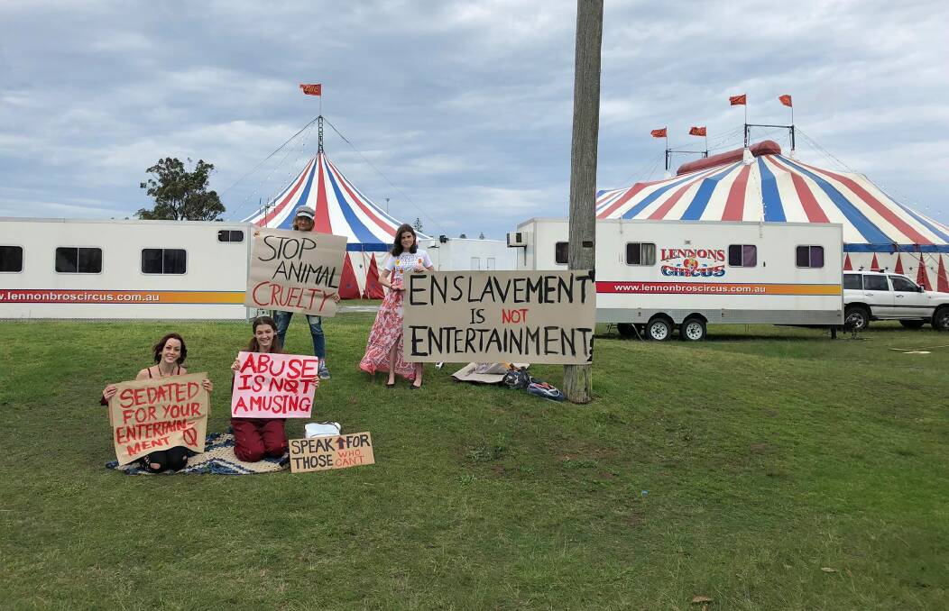 Vigil: Shanae Kristy Lyons with some of her fellow protesters outside the Lennon Bros Circus in Port Macquarie.