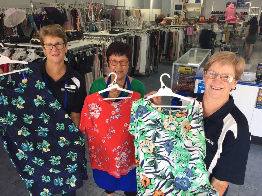 Dressed by Vinnies: St Vincent de Paul volunteers on Gordon Street Lee Hancock, Jen Sawyer and Beverley Halls with some of the fashions available at the popular op shop.