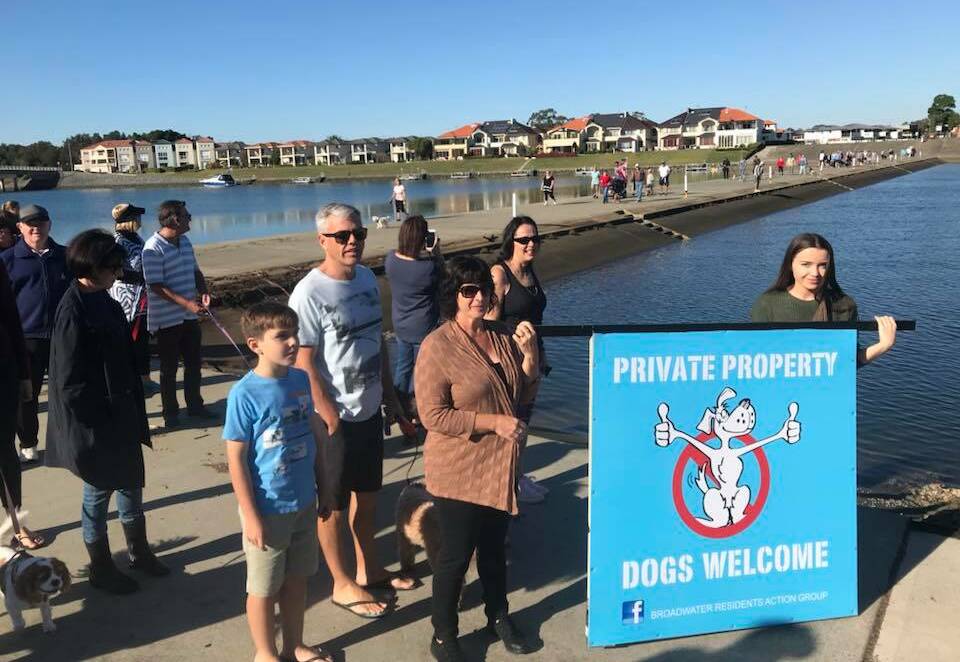 Protest walk: Broadwater Canal residents and dog lovers converged on the precinct for a protest walk on Sunday. Photo: Broadwater Residents Action Group