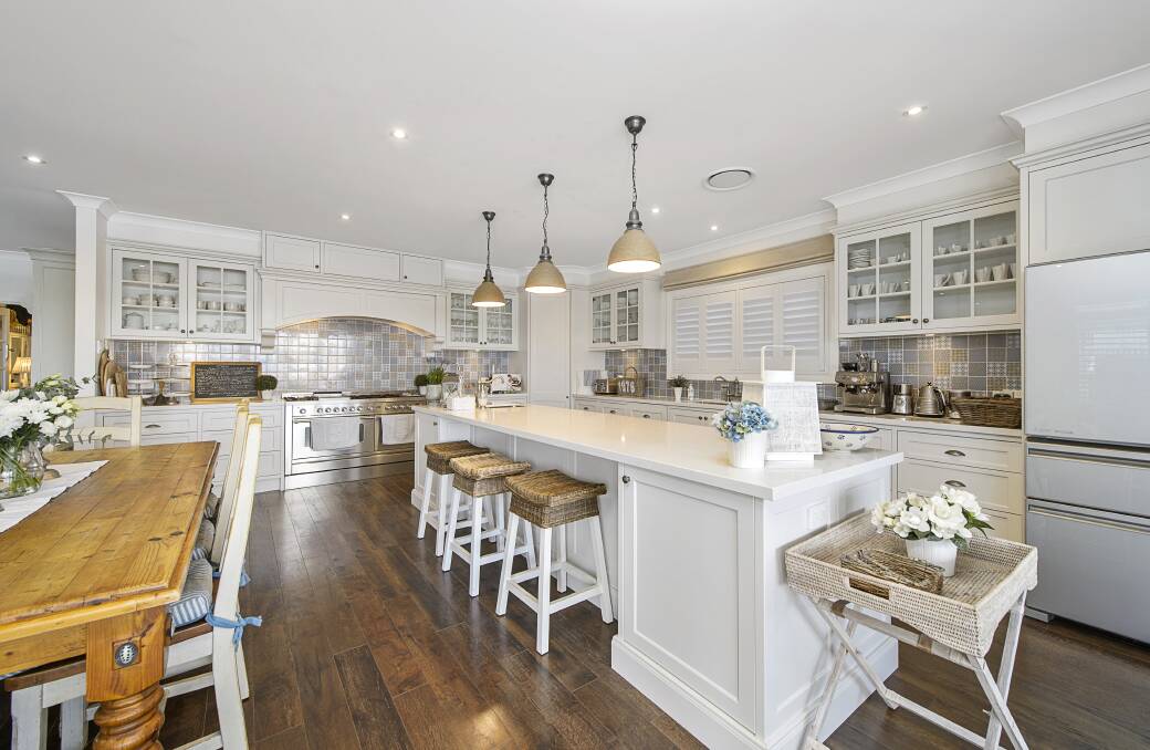 The canal home features a Long Island-themed kitchen. Photo: Elders Real Estate