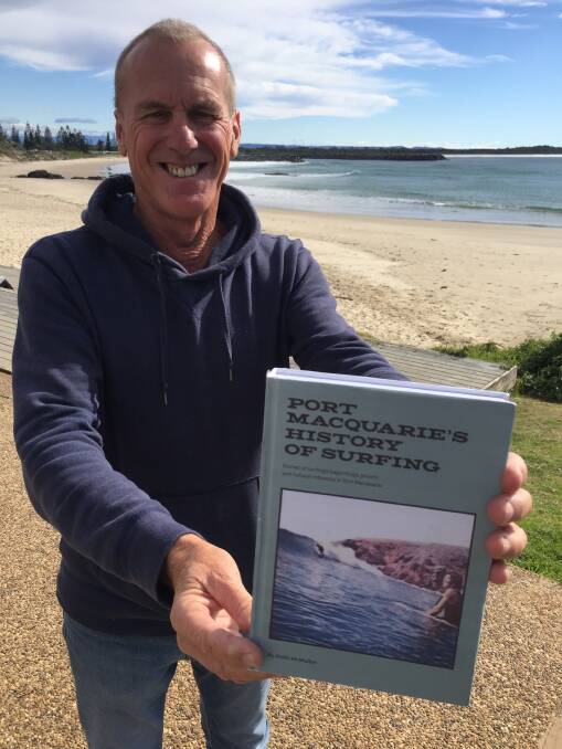 Crowd funding starts: Keith McMullen with a mock up of his book Port Macquarie's History of Surfing. Crowd funding for the book is currently underway.