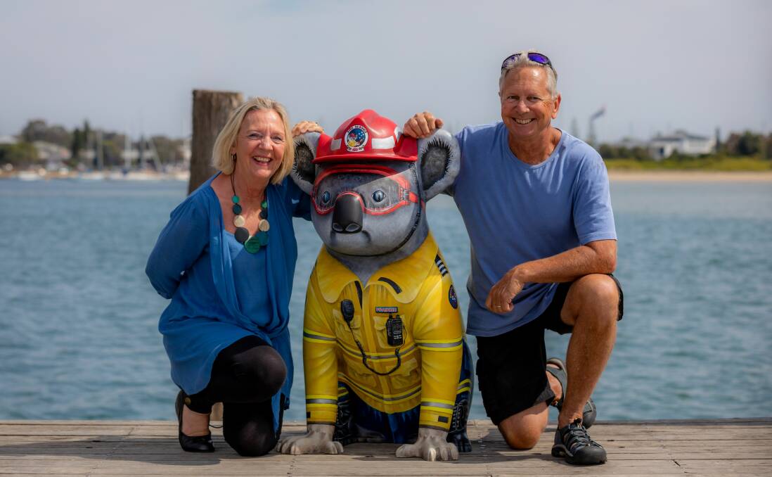 New to trail: Frankie Firefighter with local artists Kim and Wayne Staples. Photo: Lindsay Moller
