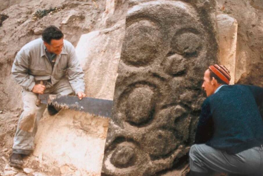 Workers use a saw to remove the ancient petroglyph from Preminghana in the 1960s. It has remained in the possession of Tasmanian museums since. Picture: supplied