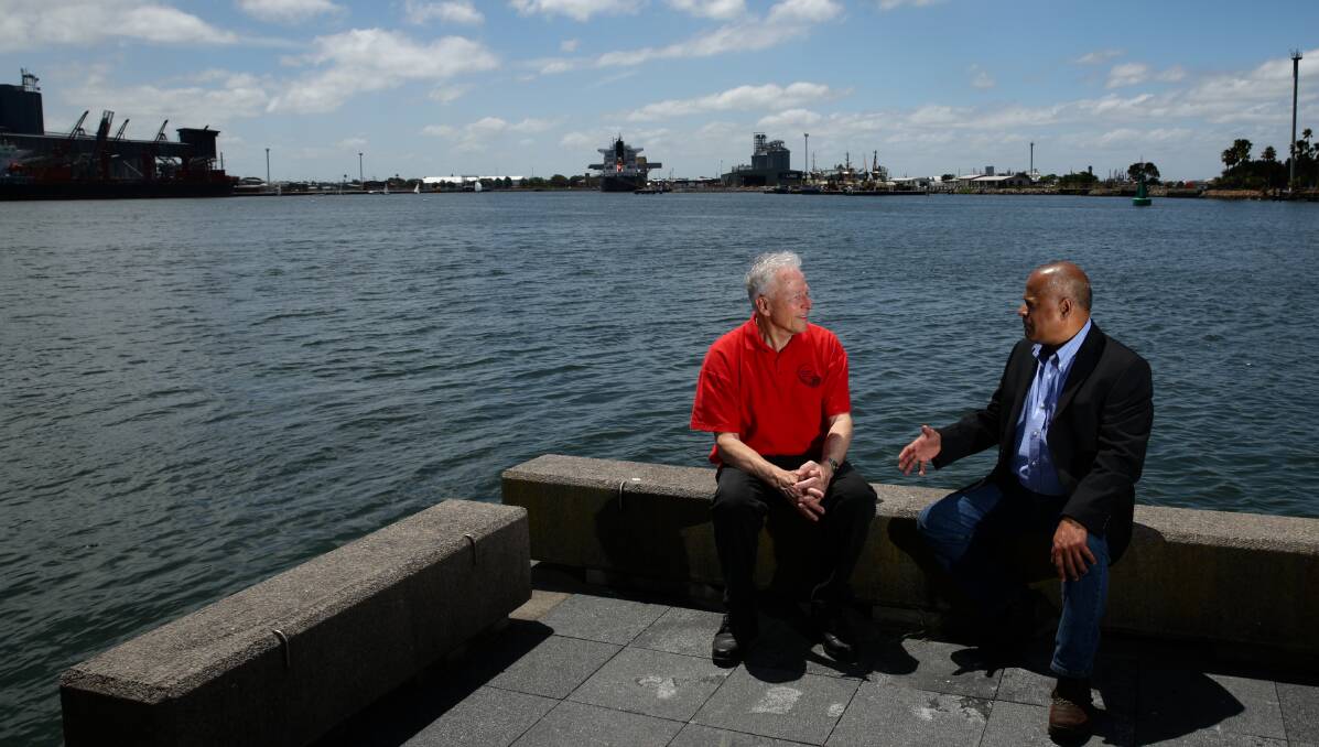 Professor Clinton Fernandes with Rod Noble of the Hunter Broad Left group in front of the Carrington Basin on Saturday. The Basin is one of three sites shortlisted for an east coast subs base. Picture by Jonathan Carroll