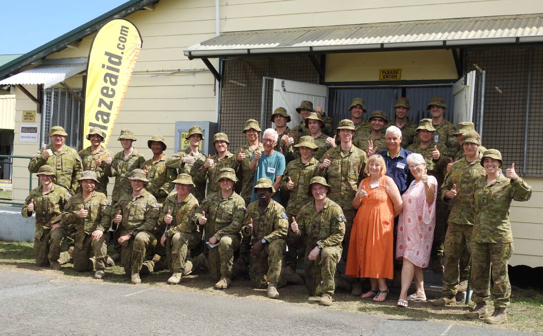 WELCOME VISITORS: Soldiers from Canberra with other BlazeAid volunteers at Wauchope Showground.