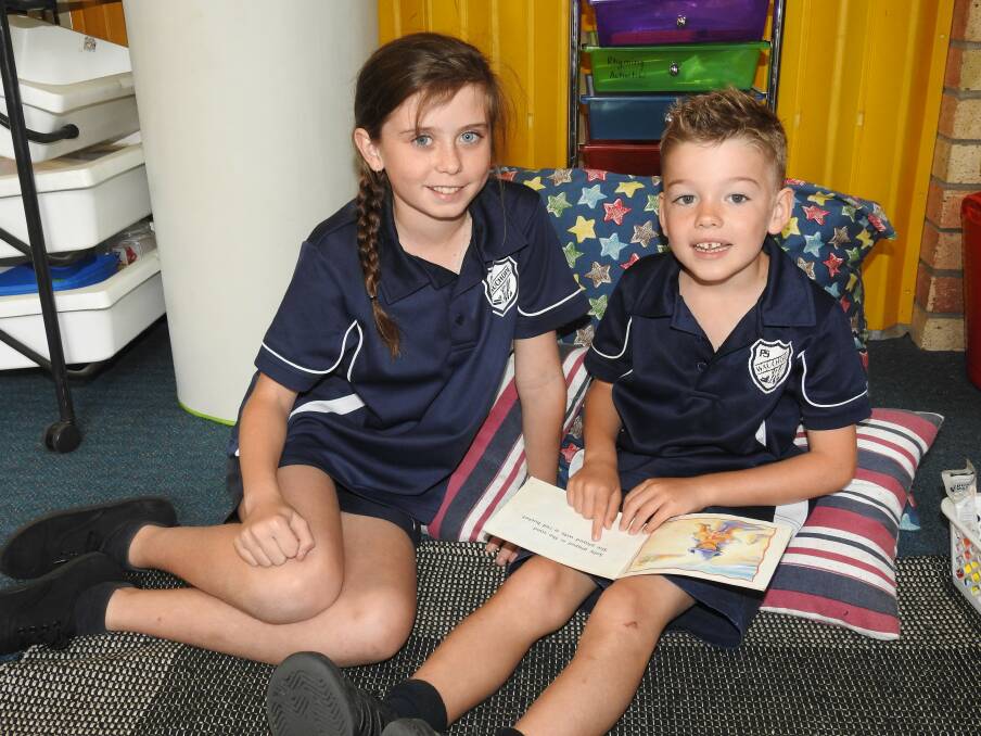 Buddy reading with Zali Croft from Year 6 and kindy Lewis Gill.