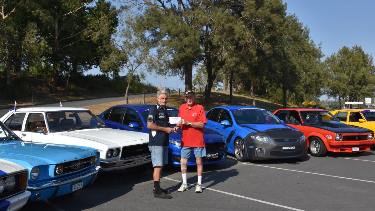 Eddie Clarke president of the Mid North Coast Ford Owners Club and Bruce Cant from the Westpac Rescue Helicopter Hastings Support Group.
