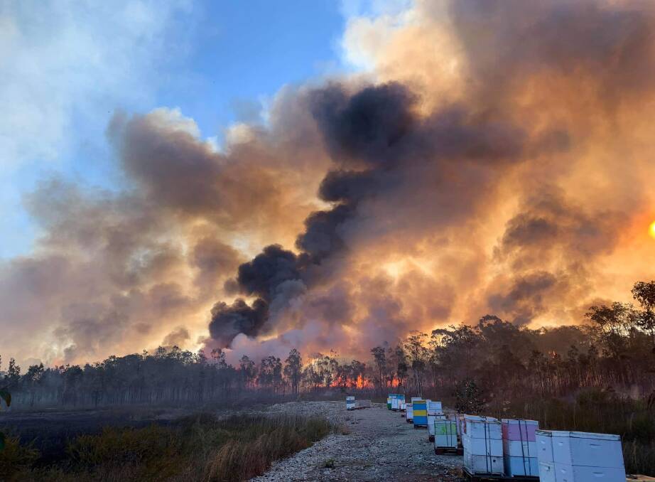 The Lindfield Park Road fire is still burning. Photo: Sancrox/Thrumster Rural Fire Brigade.