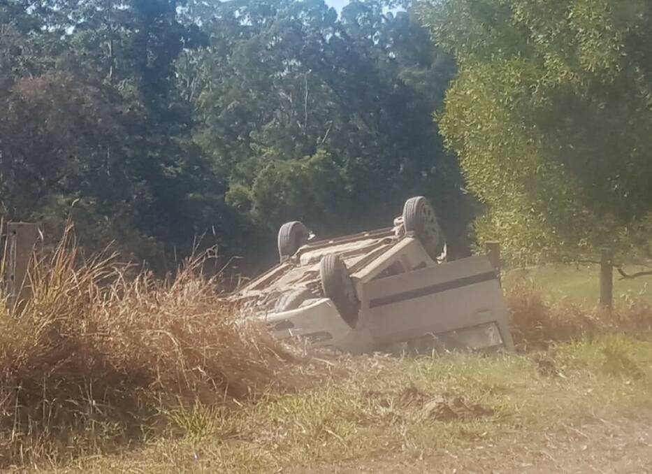 LUCKY ESCAPE: This car overturned at Bril Bril Road, which local people say is perilous.
