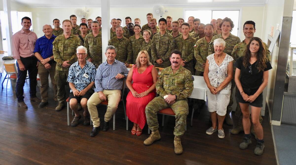CARING CREW: BlazeAid volunteers and members of the Australian Defence Force with Lyne MP Dr David Gillespie and Mayor Peta Pinson.