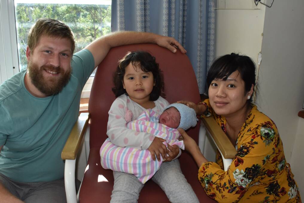 THRILLED: Sam Weaver and his wife, Viahn Vu with their daughter, Jasmin and their new-born son, Lex - the best Mother's Day present ever.