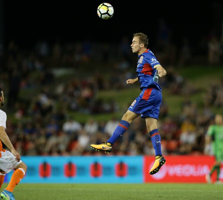 RISING STAR: Angus Thurgate in action for the Jets last season in his A-League debut, against Brisbane Roar. Picture: Jonathan Carroll