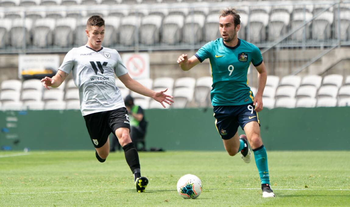 IMPRESSIVE: Angus Thurgate wins the race for possession in the Olyroos' 2-1 win over A-League new boys Macarthur on Tuesday. Picture: Tristan Furney