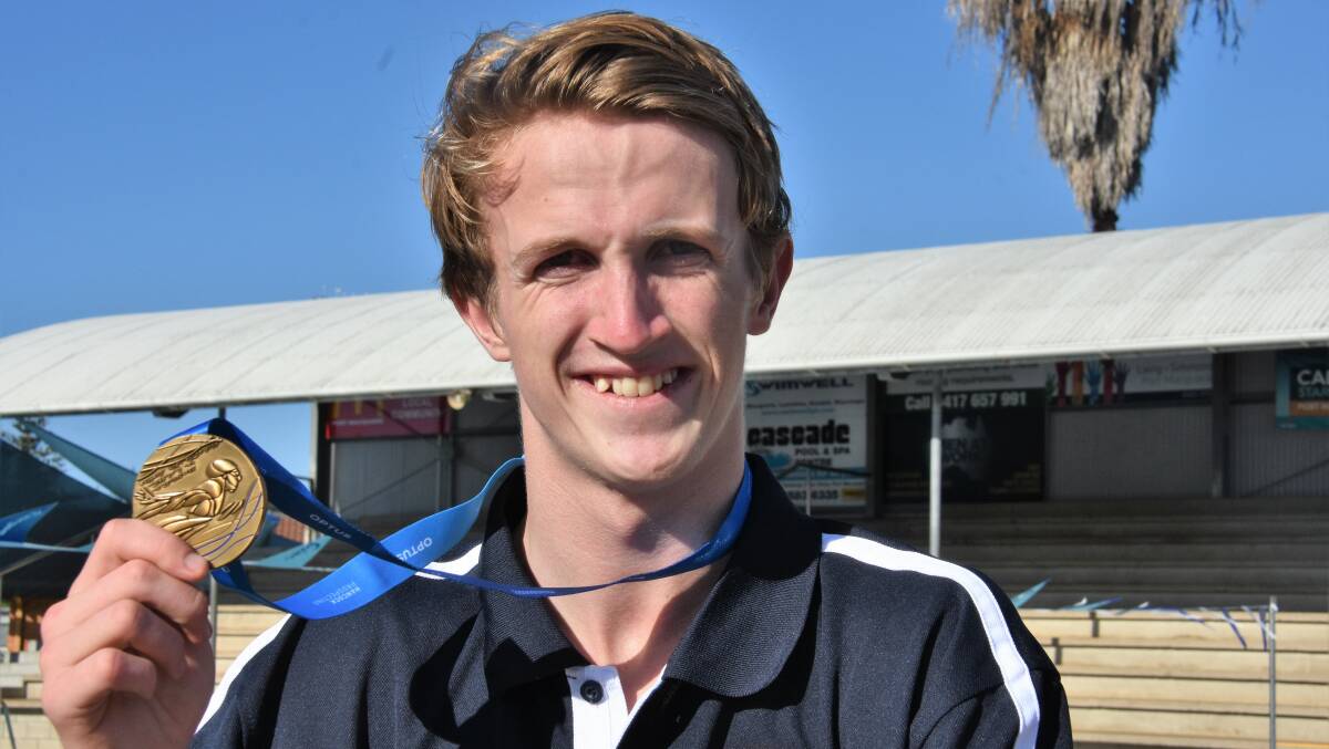 Happy days: Port Macquarie Swimming Club member Jack Agland claimed his first-ever medal at last weekend's national titles.