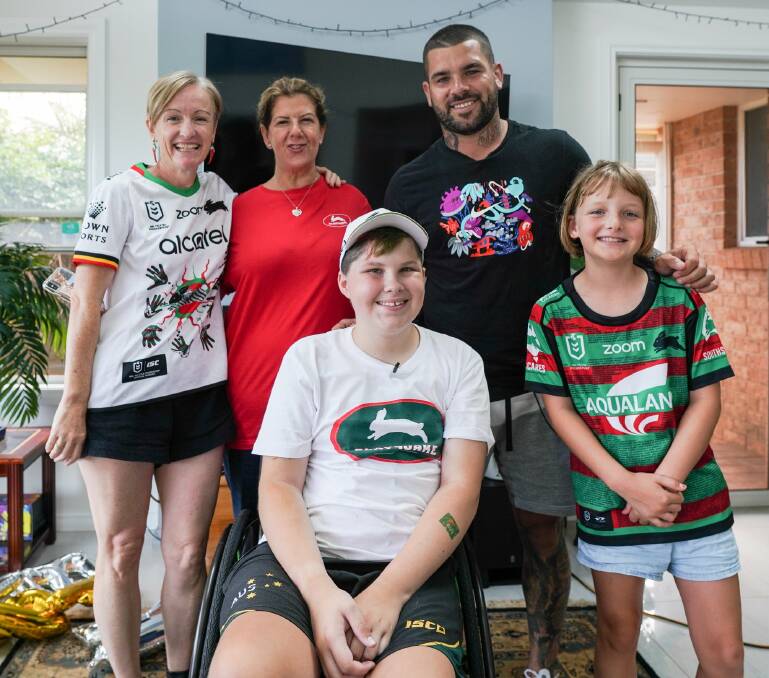 Fly high, Jake: South Sydney Rabbitohs captain Adam Reynolds (back right) with Jake Spurdle during a visit to the Hastings in January. Photo: supplied