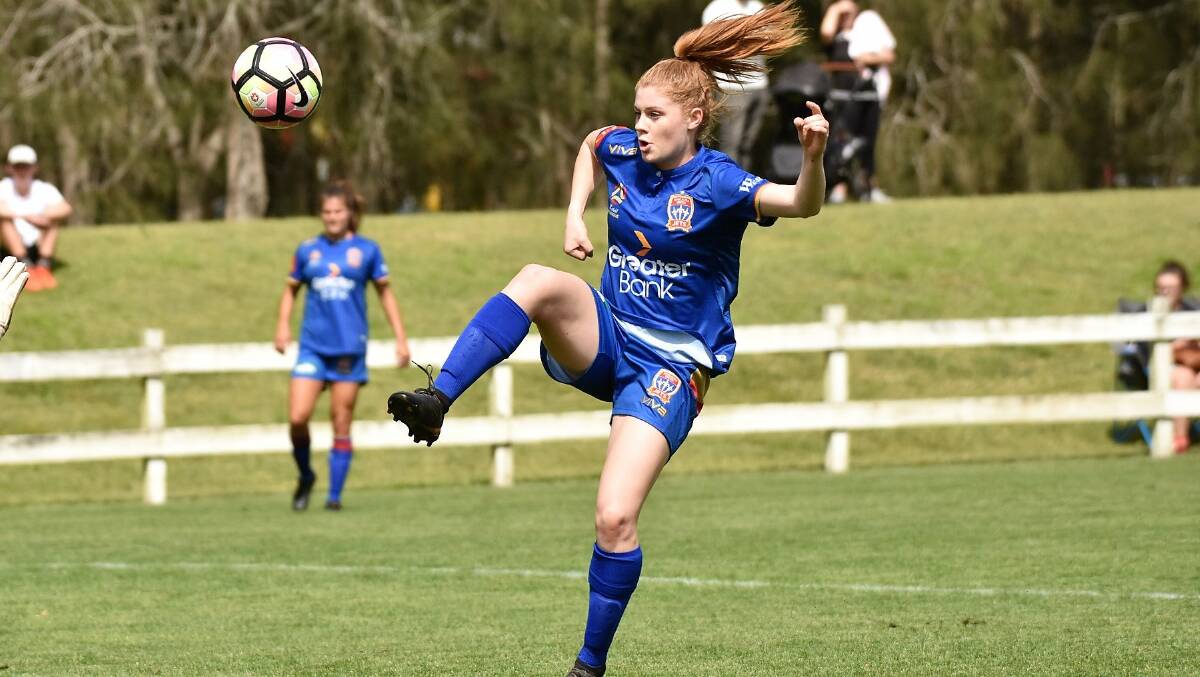 Up and over: Cortnee Vine scored a brace in the Jets' 12-0 friendly win over Mid North Coast.