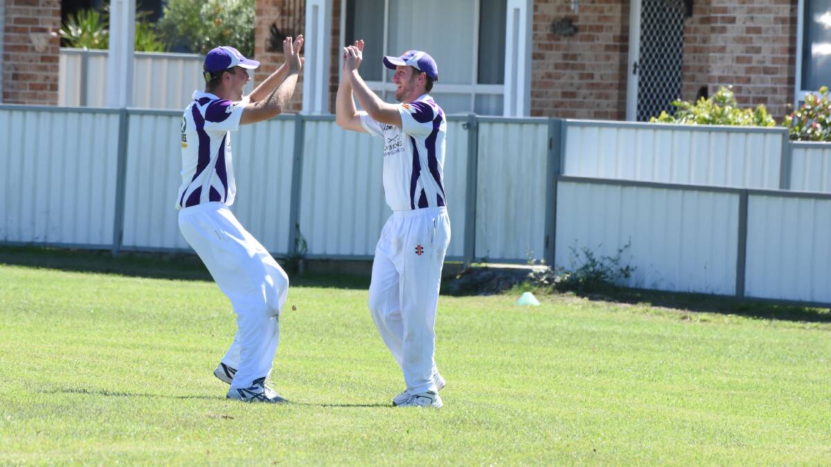 Defending champions: Taree United celebrate a wicket on the way to winning last year's title.