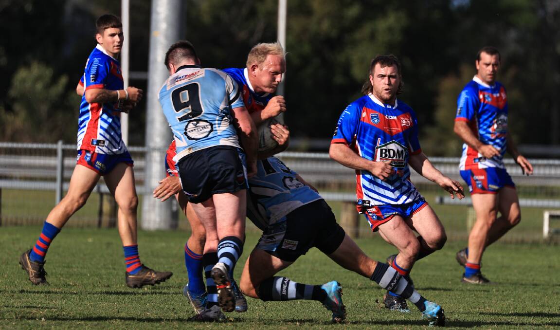 Mat Bird takes the ball into the Port City defence. Photo: Lighthouse Sports Photography