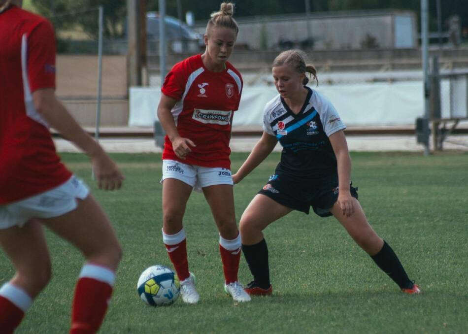 Room for improvement: Abby Baker looks for possession during a Mid North Coast match last season.