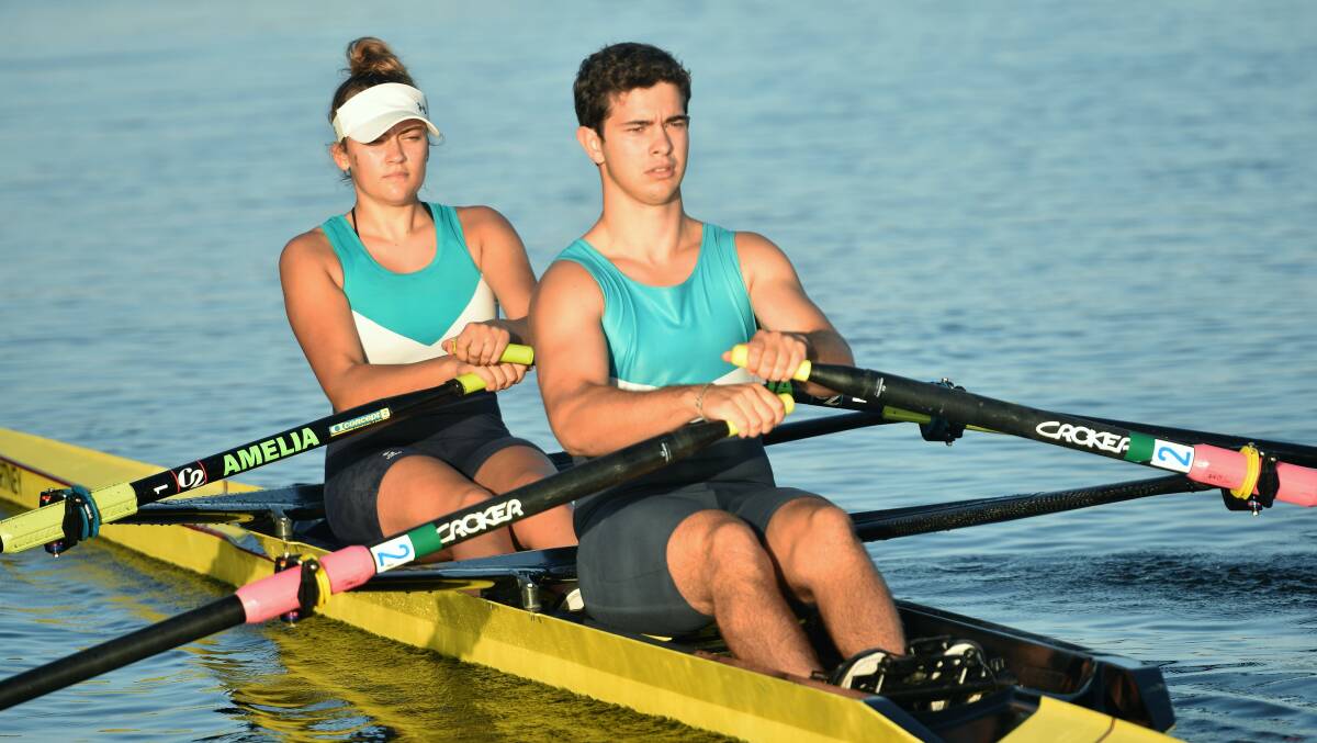 Focused: Amelia Stennett and Matthew Catania practice ahead of this weekend's NSW Rowing Championships. Photo: Paul Jobber