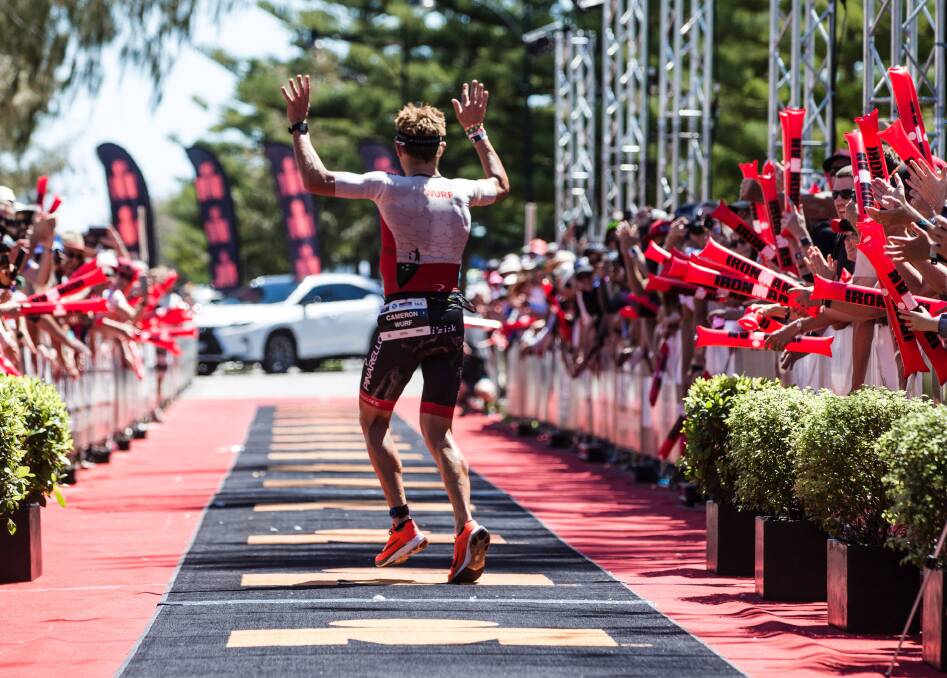 Successful: Cameron Wurf celebrates his win at the 2019 event. Photo: Ironman Australia