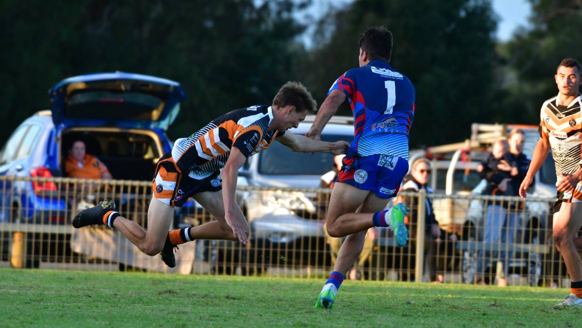 Evasive: Tony Thompson finds space against Wingham.