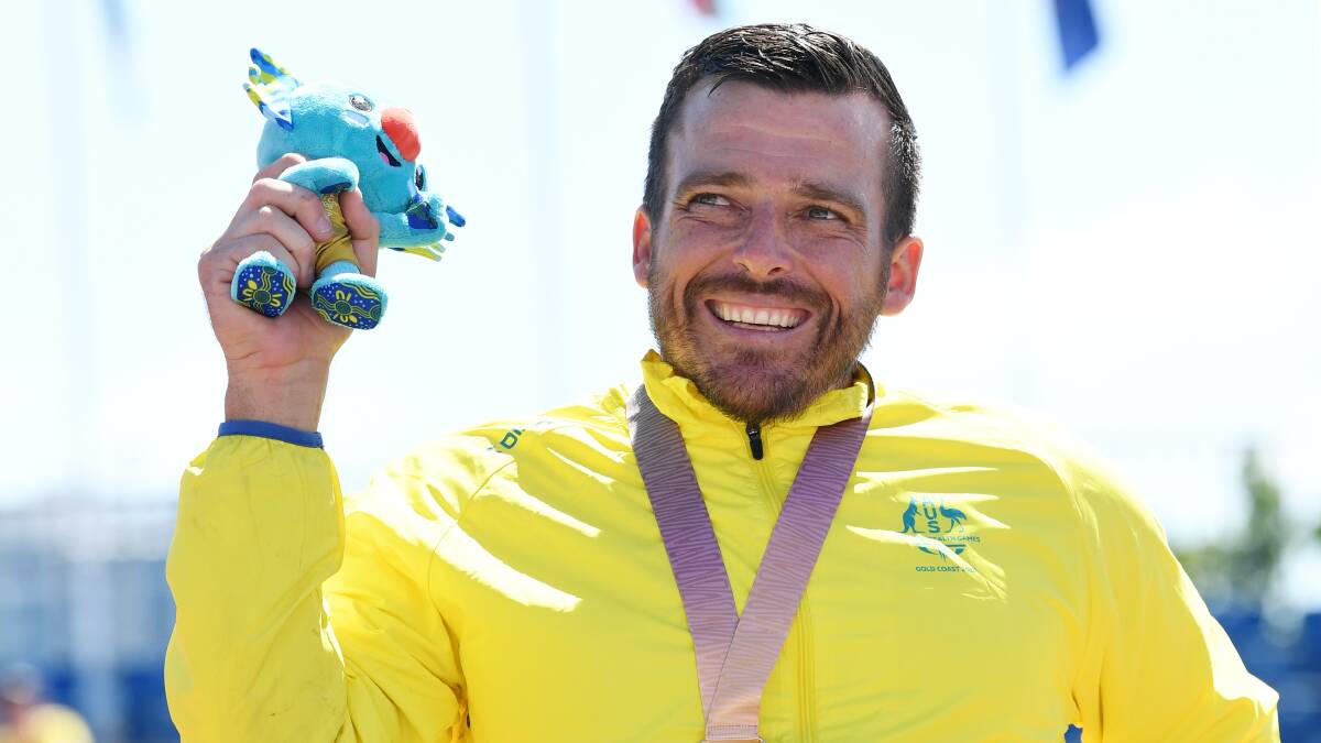 Gold medalist Kurt Fearnley of Australia during the medal ceremony for the T54 Marathon during the XXI Commonwealth Games on the Gold Coast, Australia, Sunday, April 15, 2018. (AAP Image/Dean Lewins)