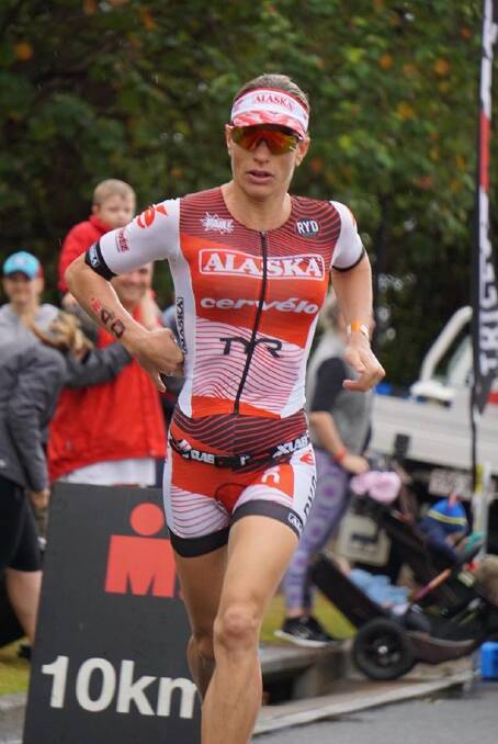 Focused: Caroline Steffen during on the run leg during her Ironman 70.3 success on the Sunshine Coast in August. Photo: supplied