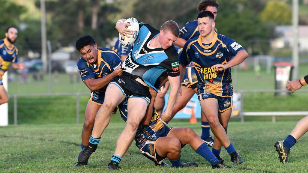 Working hard: Koby Smith battles for metres against Macleay Valley earlier this season. Photo: Penny Tamblyn