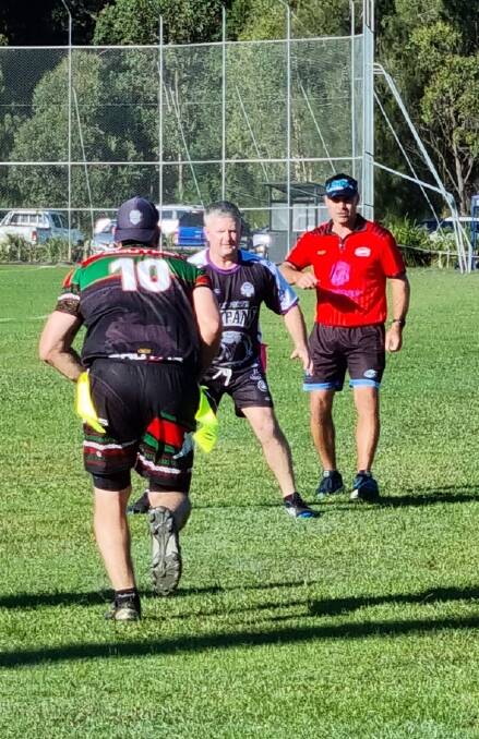 Man in charge: Dane Dickson (in red shirt) during a recent oztag tournament. Photo: supplied/Pam Potts
