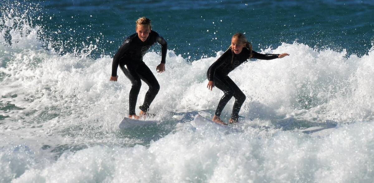 Surf's up: Kayle and Imojen Enfield prepare for the state titles.