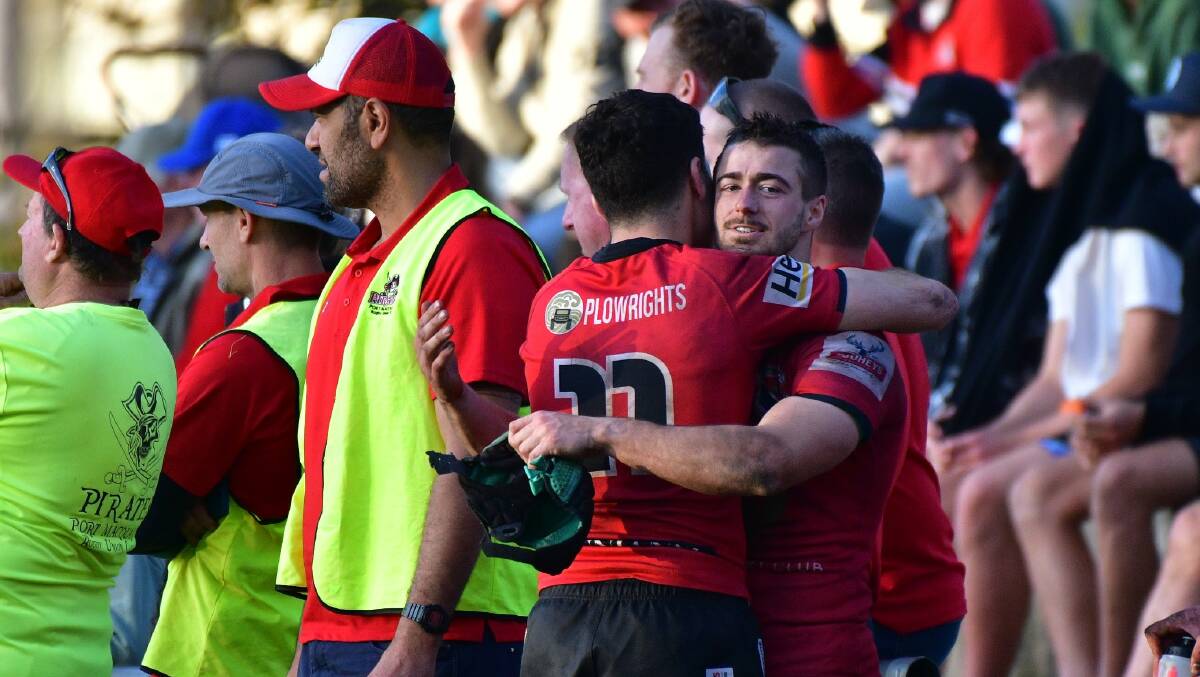 Jamieson Williams (right) and Rhys Martin congratulate each other after their 36-19 win over Coffs Harbour. Photo: Paul Jobber