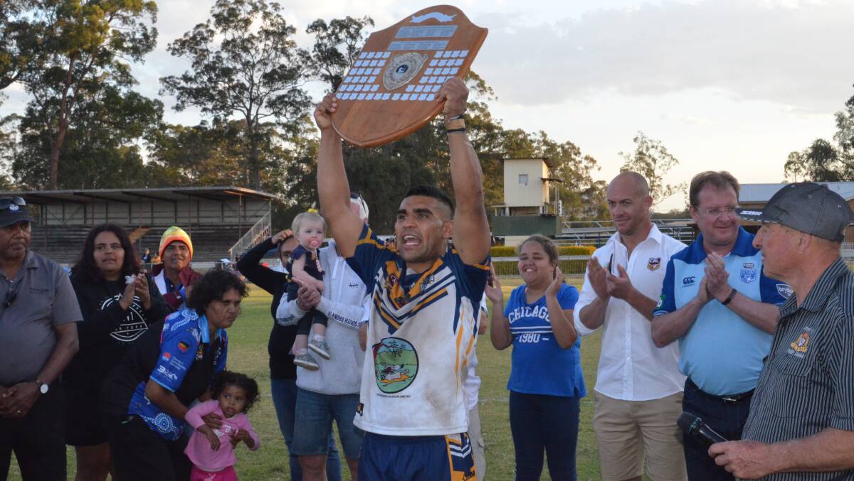 Victory: Richie Roberts lifts the Group 3 rugby league shield in 2019.