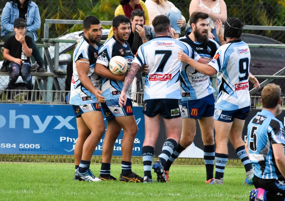 Try-time: Port City Breakers celebrate
after scoring one of their eight tries on 
Saturday. Photo: Ivan Sajko