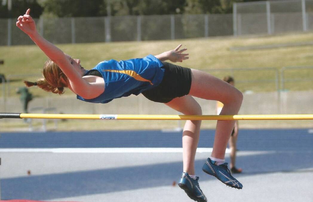 Up and over: Emily James clears 1.46m in the CIS final. Photo: Nicole James