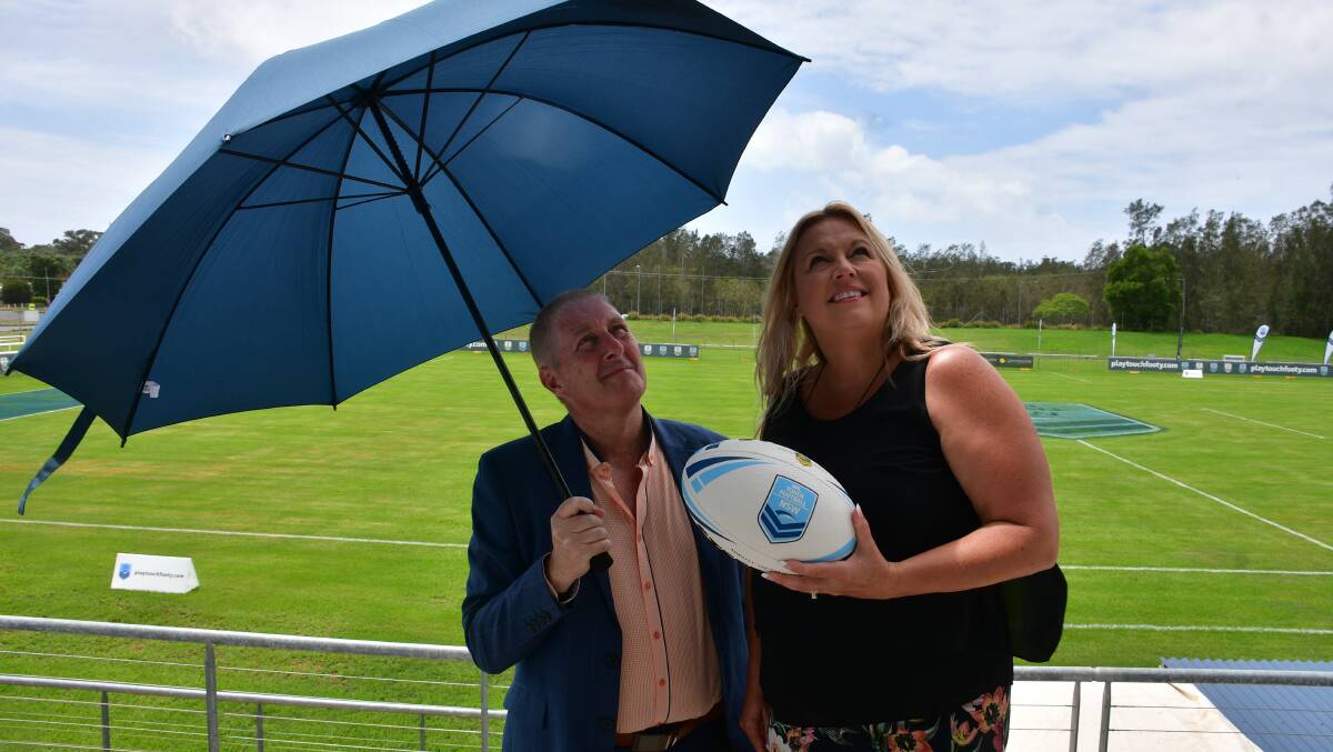 Eyes on the sky: NSW Touch Football Association general manager Dean Russell and Port Macquarie mayor Peta Pinson want no more rain over the weekend.