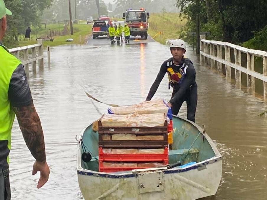 Unloading: Al's Bakehouse in Wauchope baked an extra 200 loaves of bread for residents stranded in King Creek. Photo: supplied