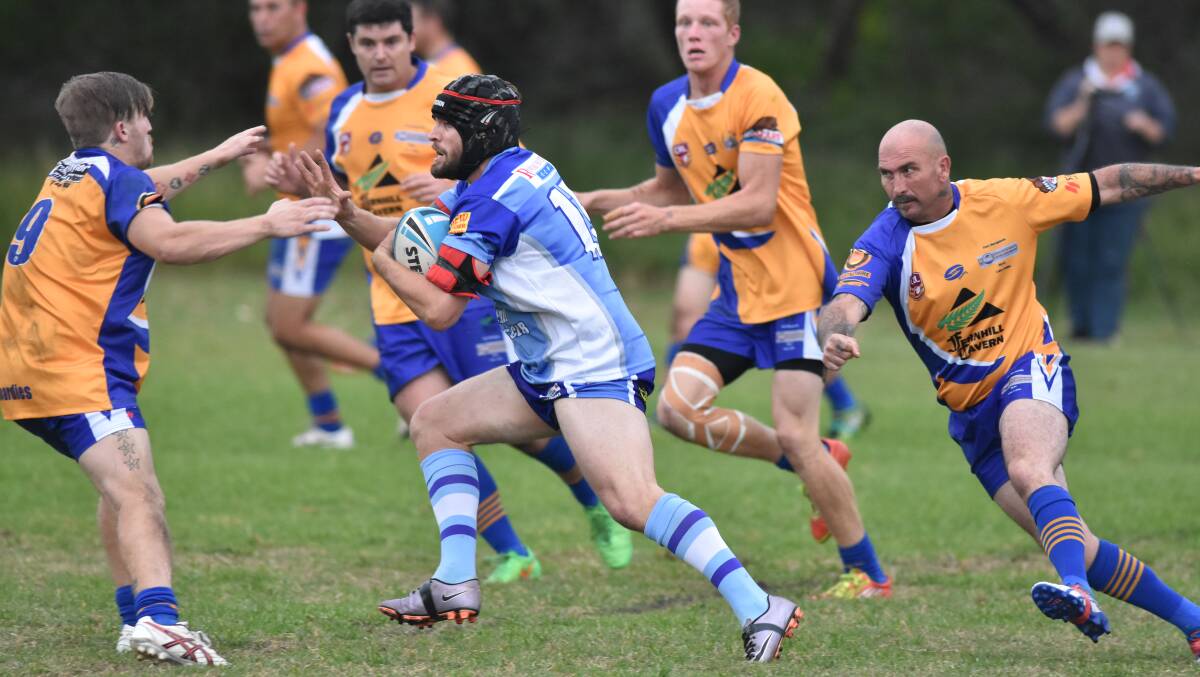 Hard and straight: Kendall's Kurt Cook takes on the Boardriders defence in last week's 30-4 win. Photo: Ivan Sajko
