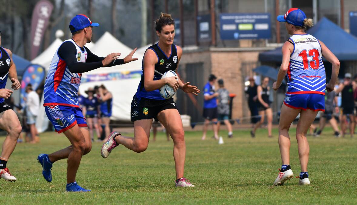 On the charge: Kelly Shipway takes on the Newcastle City defence during the weekend's State Cup.