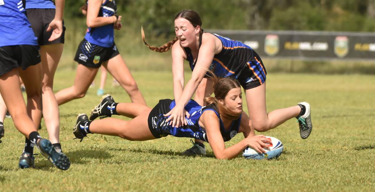 Try time: Port Macquarie's Chloe Eichmann dives over during last year's State Cup.