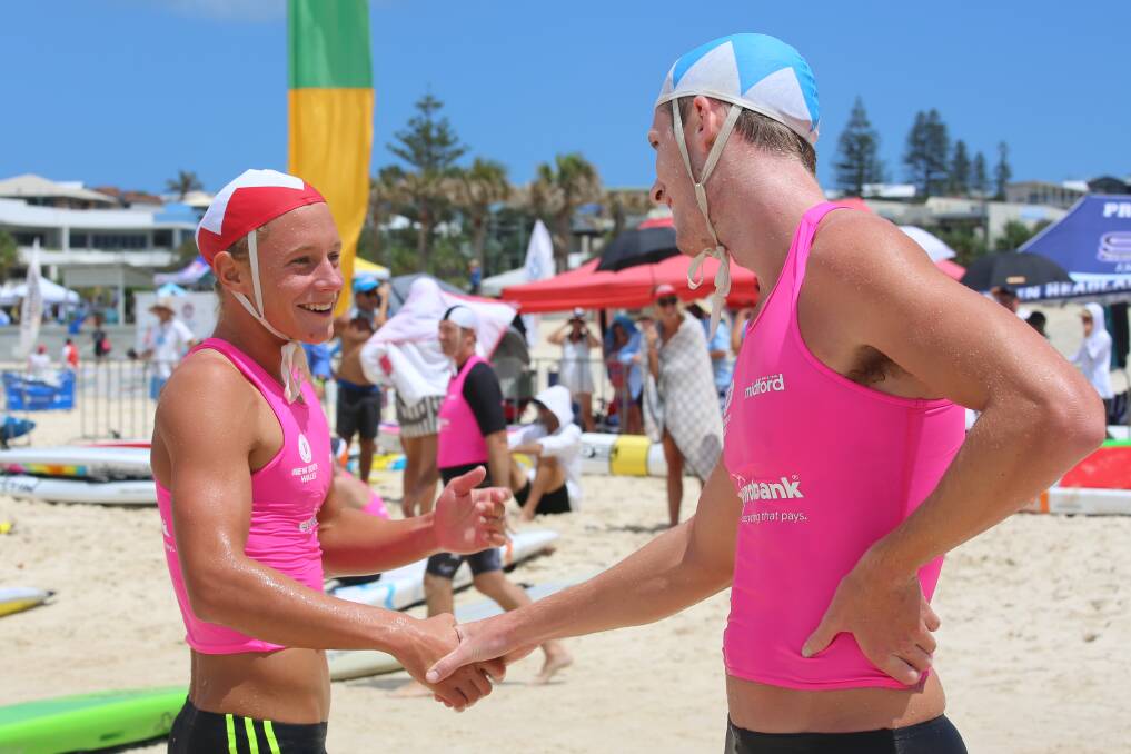 Winner: Finn Askew (left) celebrates after one of his five gold-medal performances. Photo: Surf Life Saving NSW