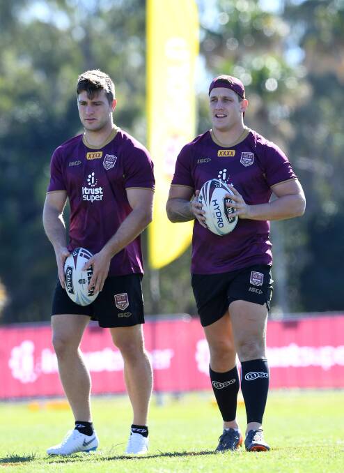 Jai Arrow (left) and Jarrod Wallace during the Queensland State of Origin team training session at Sanctuary Cove on the Gold Coast, Thursday, May 31, 2018. Photo: AAP/Dave Hunt
