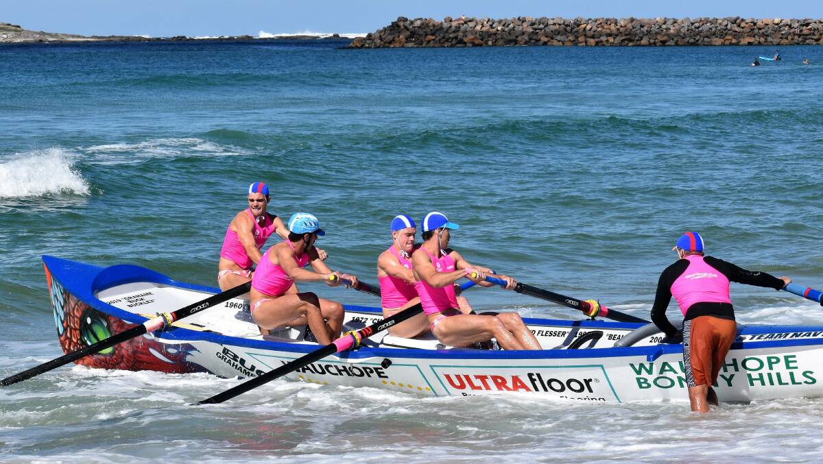 Building: Wauchope-Bonny Hills Surf Life Saving Club's under-23 men's crew are poised for a tilt at this season's North Coast Surfboat Series. Photo: supplied/Phil Kaufmann